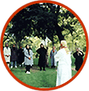Dr. Sonia teaching Qi Gong in a park.
